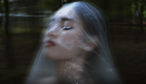 Woman wrapped in plastic